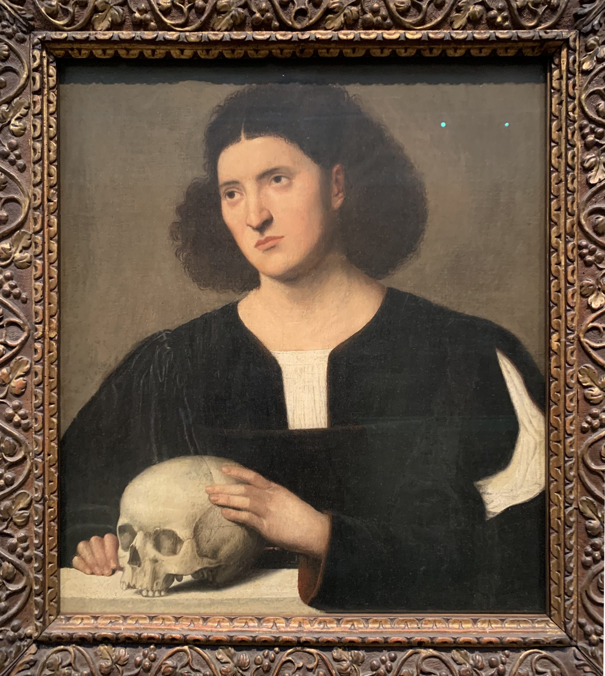 Portrait of a young Man with a Skull