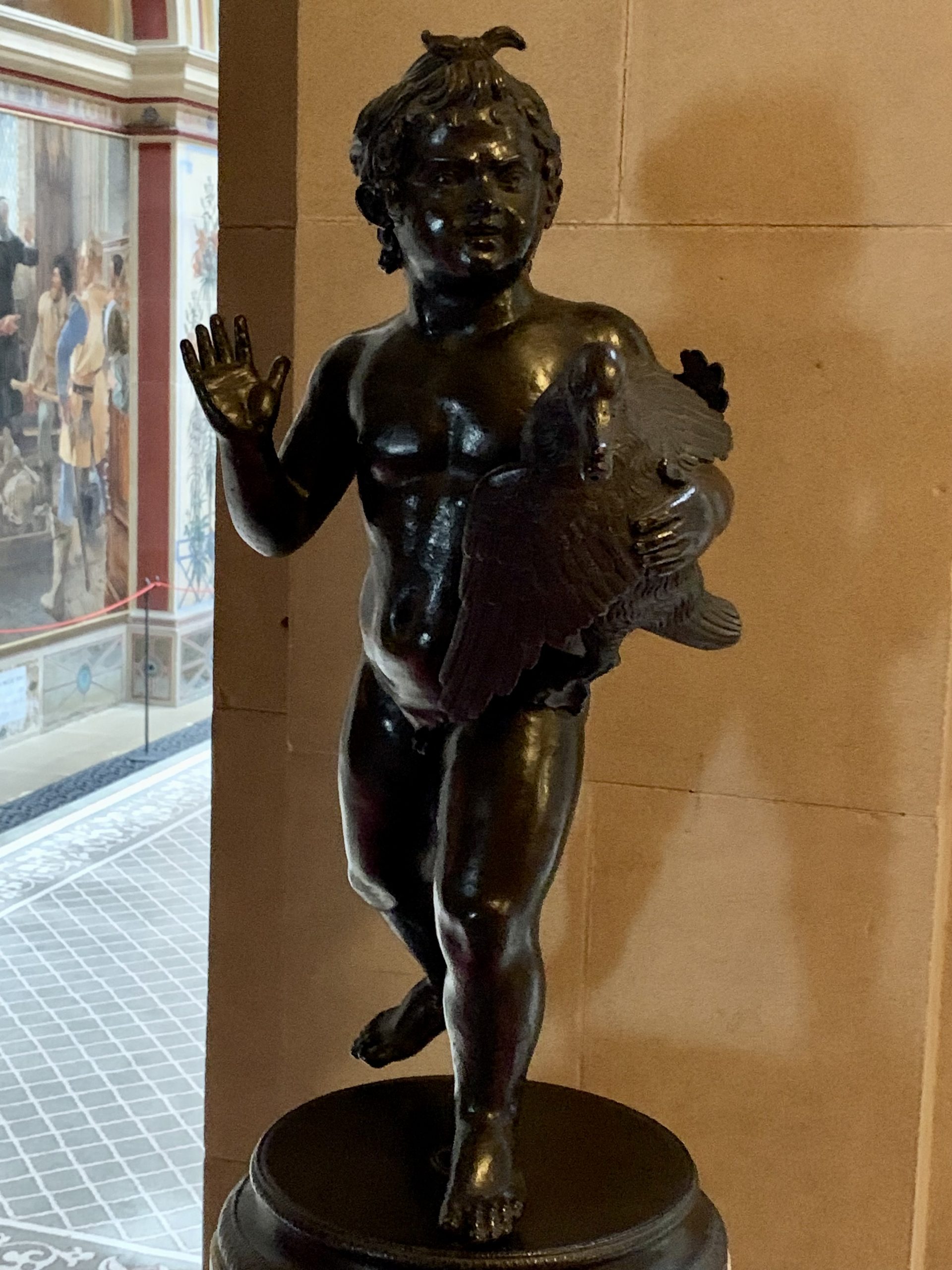 Cherub holding a Duck